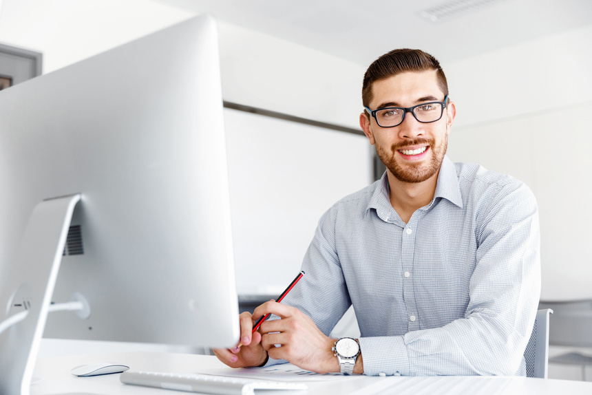 Male Office Worker Sitting at Desk